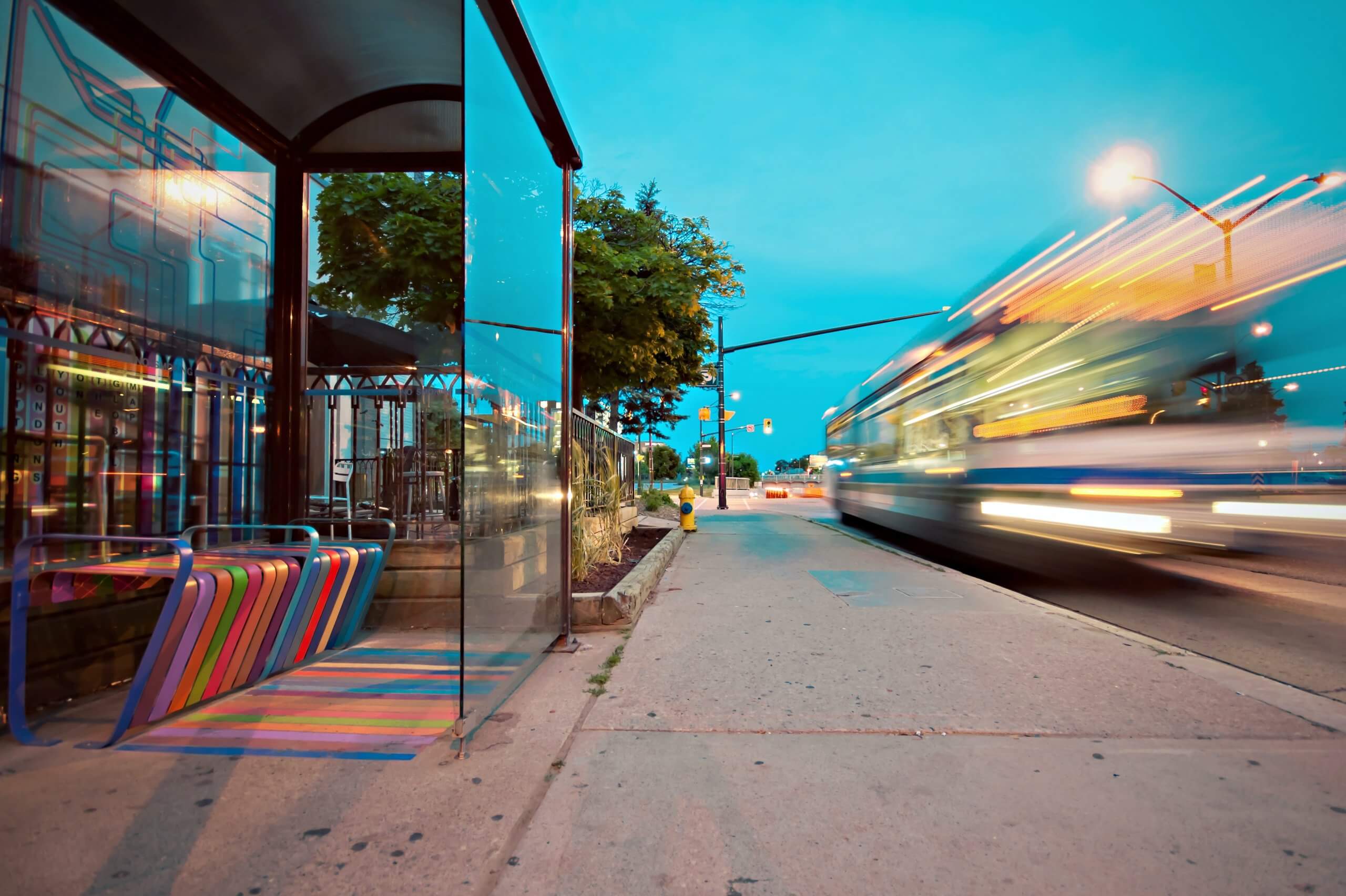 bus travels quickly down a city street in Baltimore